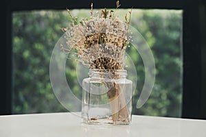 Dried flower branches embroidered in glass jars for home decorations