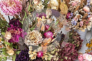 Dried flowers arrangement close up. Sustainable floristry. Home decor with dried flowers. photo