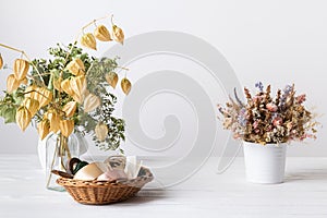 Dried flowers arrangement. Sustainable floristry. Arranging dried flowers into a beautiful bouquet. photo
