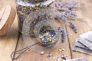 Dried flowers of lavender and mallow on a wooden background. Natural health. Aromatherapy. Free space for text. Copy space