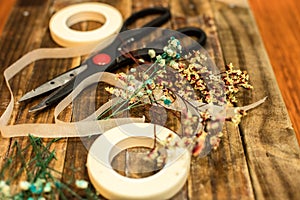 Dried flowers and tools