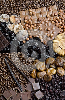 dried fruit with chocolate and coffee beans photo