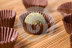 Dried fruit energy balls on a wooden table