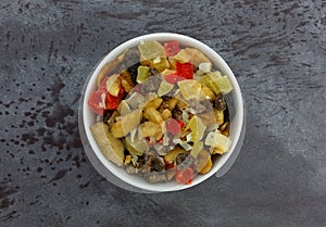 Dried fruit mix in a white bowl