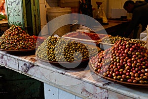 Dried fruit and nuts on market stall at the bazaar in Marrakesh, Morocco