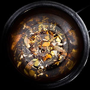 Dried fruit tropical mix in tea strainer photo