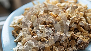 Dried fruiting bodies of Hericium erinaceus mushroom close-up