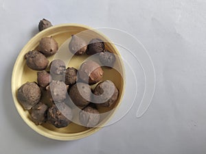 Dried fruits of beleric Myrobalan or Terminalia bellirica photo