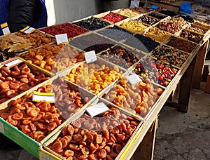 Dried fruits on the market stall. Sale of natural food. Dried oriental sweets. Healthy lifestyle. Non-calorie food. Natural vitami