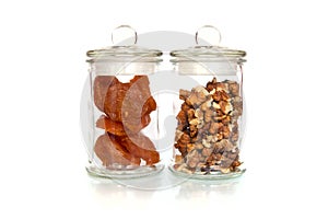 Dried fruits and nuts in a glass jar