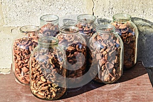 Dried fruits in the three-liter jar. Dried apples, cut into slices