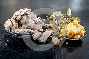 Dried ginger with holy basiland jaggery.