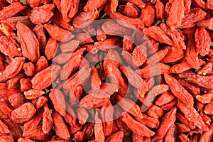 Dried goji berries closeup food background texture