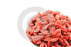 Dried goji berries in a small white bowl