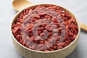 Dried goji berries or wolfberries in a bowl close up