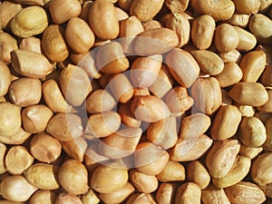 Dried groundnuts background. Close-up view.