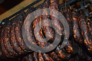 Dried handmade sausages , closeup