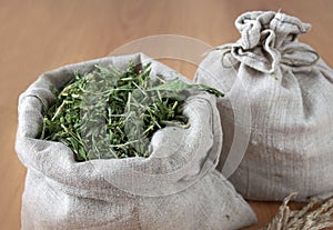 Dried herbs in linen bags