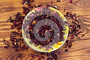 Dried hibiscus carcade, roselle on wooden table