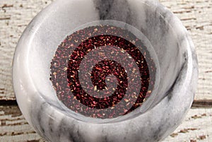 Dried Hibiscus Flower Leaves Tea In Marble Bowl
