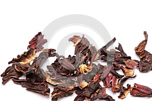 Dried hibiscus flowers, isolated at the bottom of the image photo