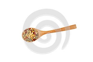 Dried Ingredients for Indian pea soup with curry in wooden spoon on white background.  Green and yellow crushed dry peas with