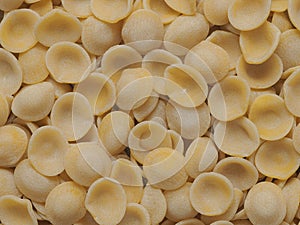 Dried italian orecchiette pasta food background