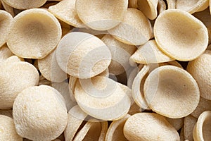 Dried italian orecchiette pasta food background