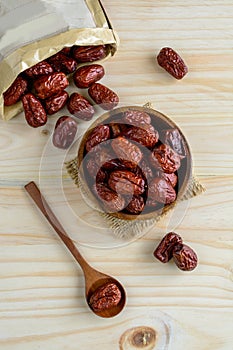 Dried jujube fruit on wooden table