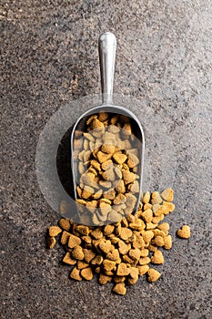 Dried kibble pet food. Heart shape dried animal food