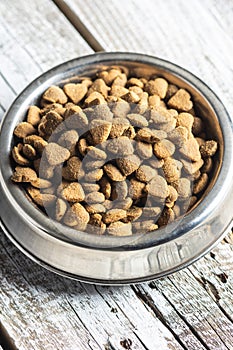 Dried kibble pet food. Heart shape dried animal food