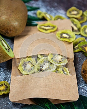 Dried kiwi in paper package top view