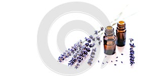 Dried lavender with a bottle of essential oil
