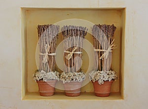 Dried lavender flowers in three vases