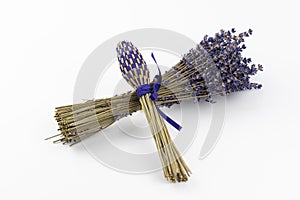 Dried lavender (Lavandula) flowers and handmade lavender wand isolated on white background