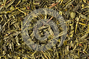 Dried leaves of green bancha tea, full frame.