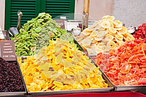 Dried mango, kiwi, dates, banana, pineapple, cranberry  for sale on Porreres Market. Majorca photo