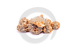 Dried mulberries fruit isolated on white