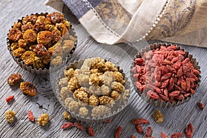 Dried mulberries, physalies and goji berries