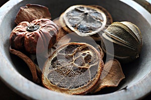 Dried orange slices stored in a bowl