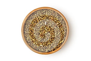 Dried oregano in wooden bowl on white background