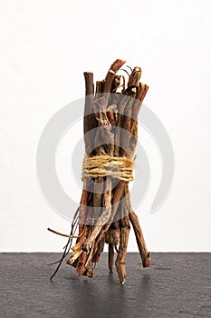 Dried organic sarsaparilla sticks - Smilax aspera photo