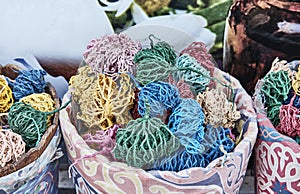 Dried, painted colorful plants of Jericho rose, heart of desert as souvenir for tourists in Egypt