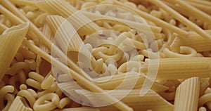 Dried Pasta Shapes Of Macaroni, Spaghetti And Penne