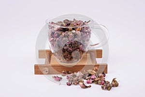 Dried Peach Blossom In Tea Cup