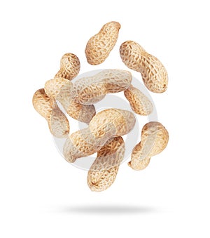 Dried peanuts close-up in the air on a white background