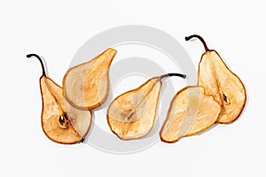 Dried pear slices on white background