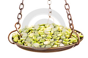 Dried peas in a balance scale