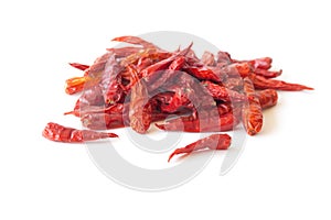 Dried pepper chillies on white background