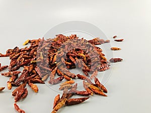 Dried peppers placed on a gray background